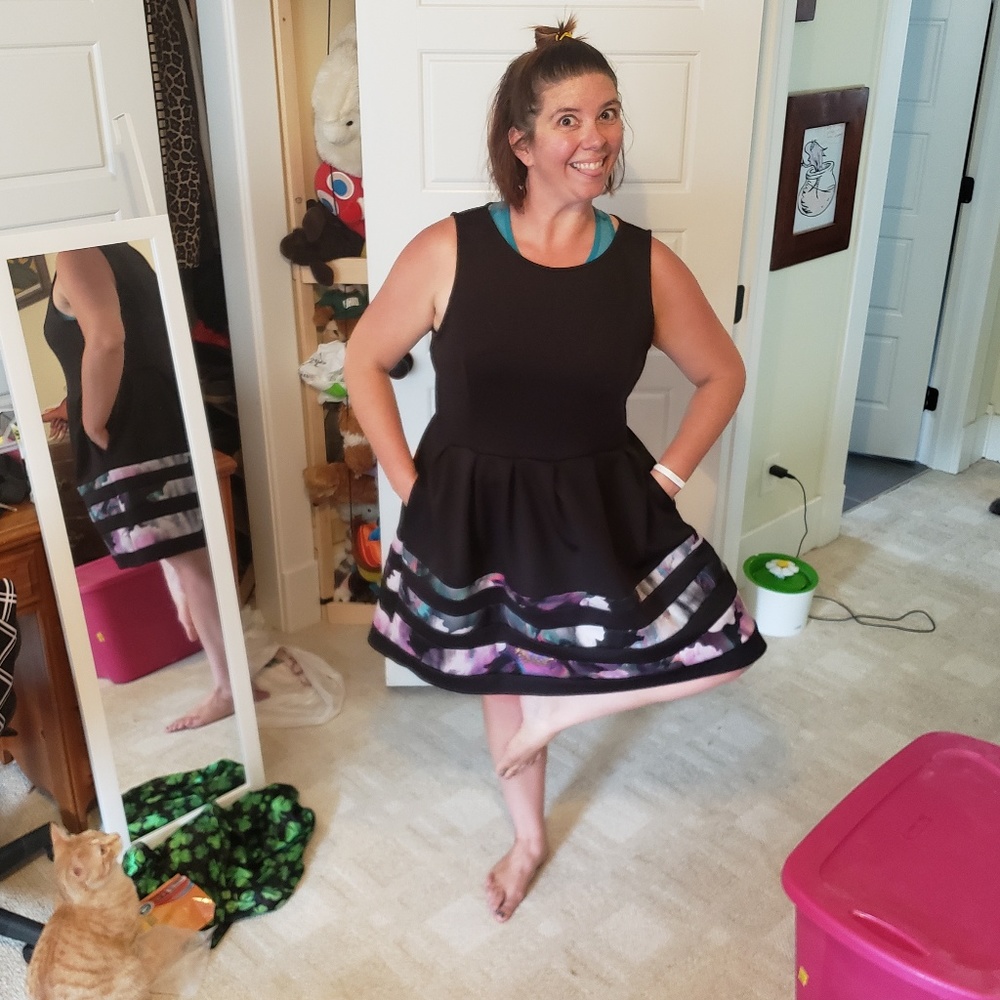 Fun, flowy black dress with deep pockets!